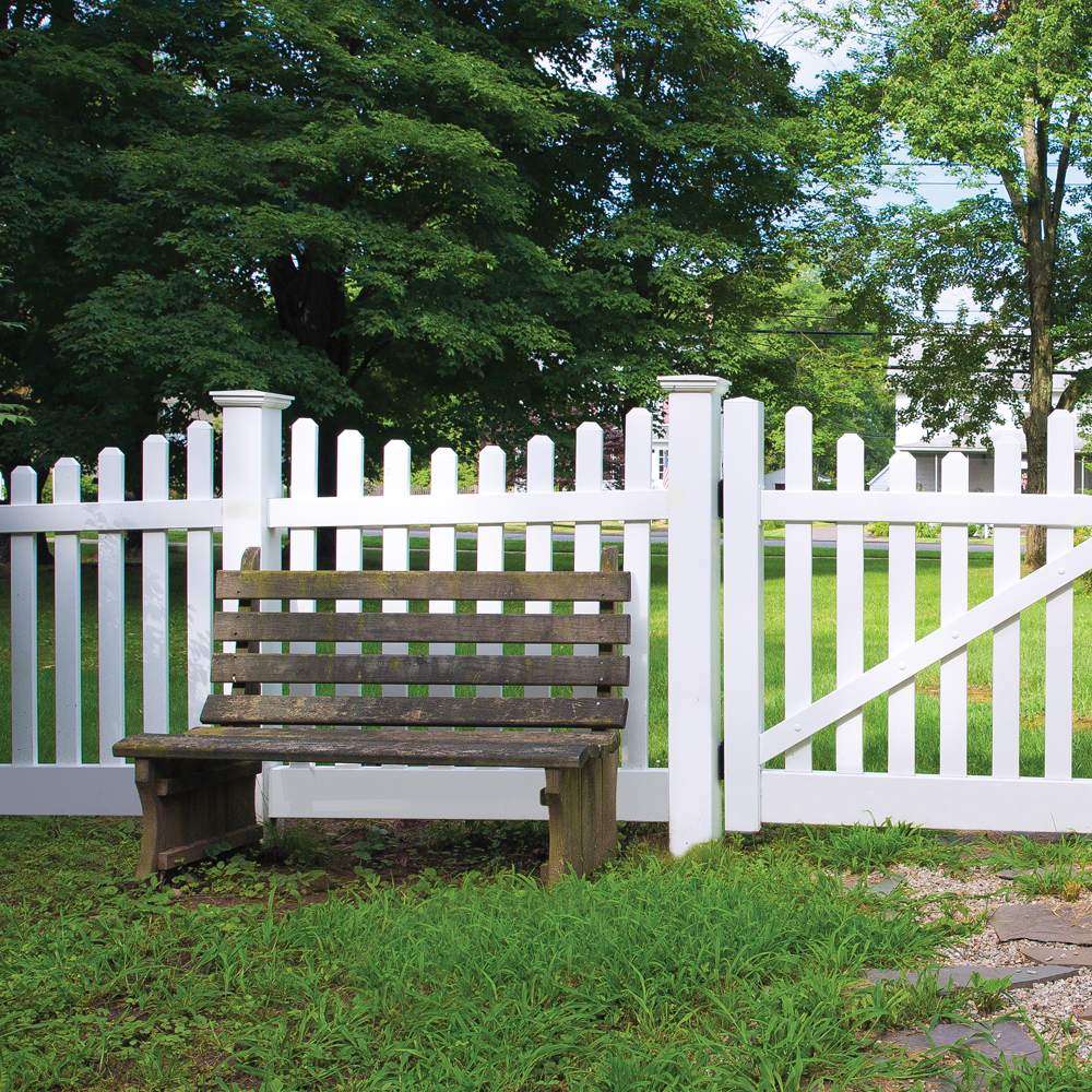 Photo of a white picket vinyl fence