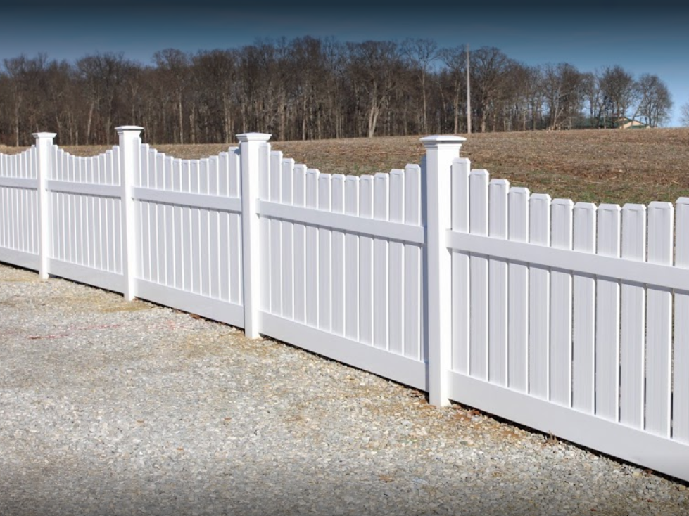 Photo of a white vinyl picket fence