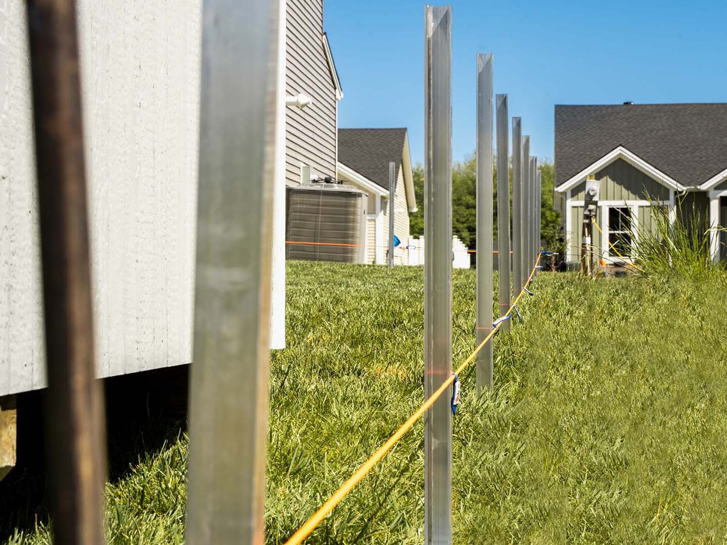 Photo of no-dig aluminum fence installation in Indiana